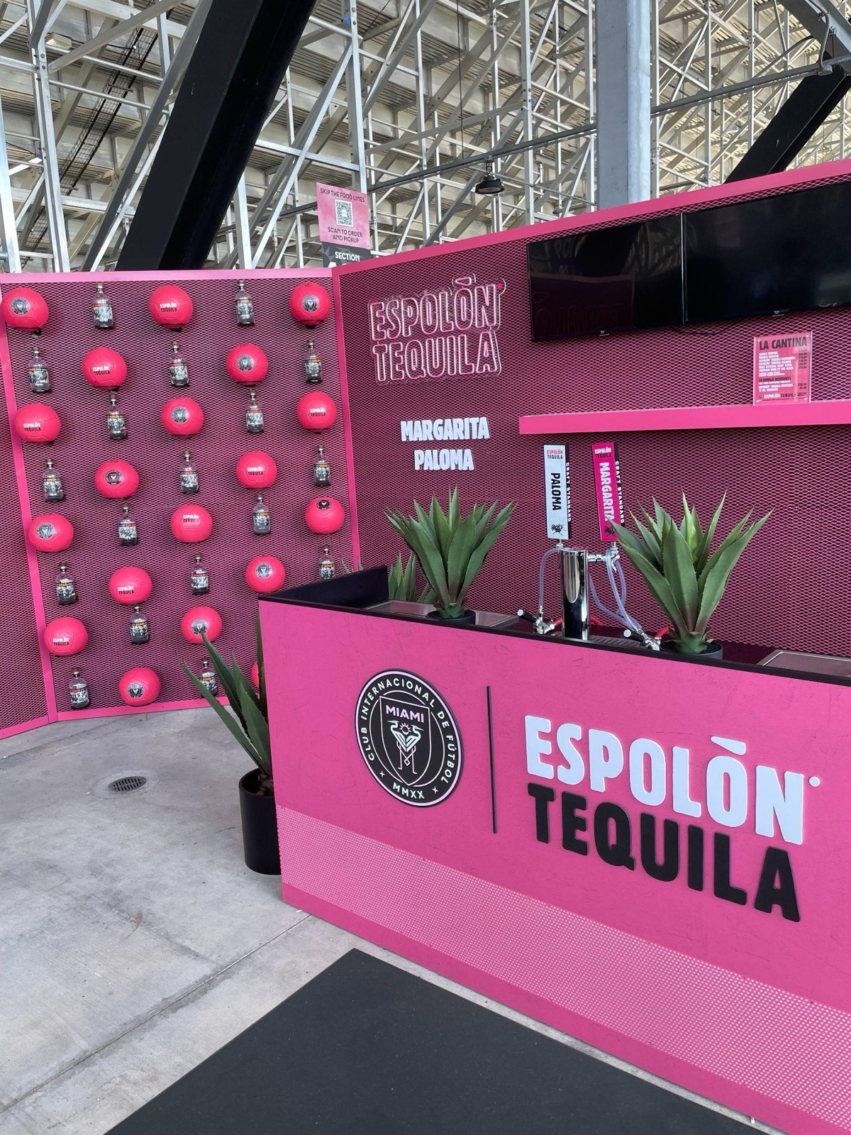 A co-branded Craft Standard and Espolon Tequila draft activation on a stadium concourse